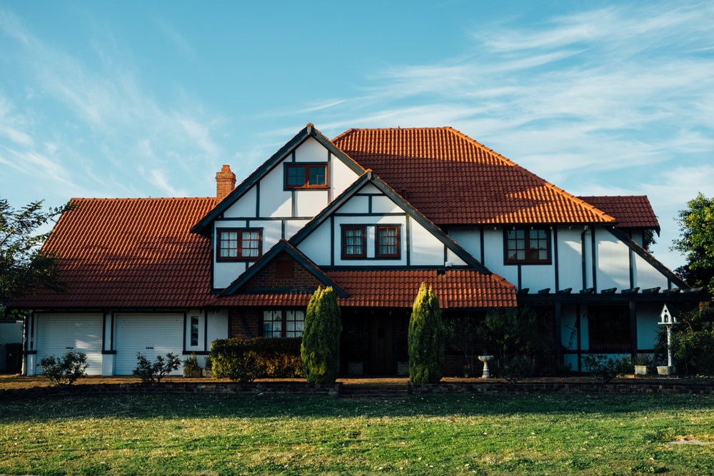 white and brown house during daytime